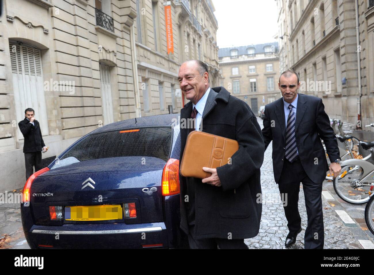 Former French president Jacques Chirac arrives at his office in Paris, France, on November 3, 2009. Jacques Chirac will be the first former French president to be tried for corruption, officials said, after charges from his years as mayor of Paris returned to taint the twilight of his long career. Jacques Chirac stands accused of giving political allies lucrative bogus jobs as city hall 'ghost workers' and his trial will be the latest in a series to expose graft and dirty tricks at the highest levels of state. Photo by Mousse/ABACAPRESS.COM Stock Photo