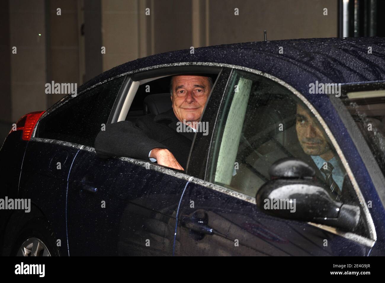 Former French president Jacques Chirac leaves his office in Paris, France, on November 3, 2009. Jacques Chirac will be the first former French president to be tried for corruption, officials said, after charges from his years as mayor of Paris returned to taint the twilight of his long career. Jacques Chirac stands accused of giving political allies lucrative bogus jobs as city hall 'ghost workers' and his trial will be the latest in a series to expose graft and dirty tricks at the highest levels of state. Photo by Mousse/ABACAPRESS.COM Stock Photo