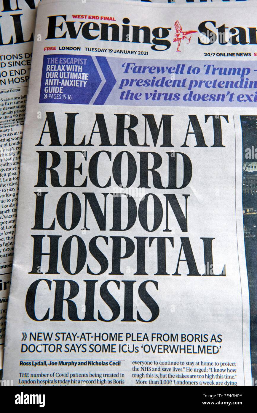 Newspaper Headline or headlines in the Evening Standard 'Alarm at Record London Hospital Crisis' Tuesday 19 January 2021 Covid 19 Coronavirus Pandemic Stock Photo