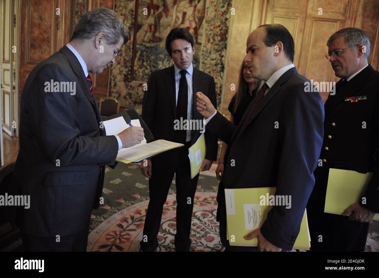 French President's diplomatic advisor and sherpa Jean-David Levitte speaks with Olivier Colom and French President's advisor technical at the diplomatic committee charged with Americas, Russia, the Caucasus, Balkans and the Central Asia Damien Loras during the visit of Brazilian President at the Elysee presidential Palace in Paris, France on November 14, 2009. Lula arrived in Europe on November 14 to attend a UN food agency meeting in Rome and discuss climate change and military jets in Paris, to boost Brazil's air force's capabilities of patrolling the Amazon and offshore oil fields. Photo by Stock Photo
