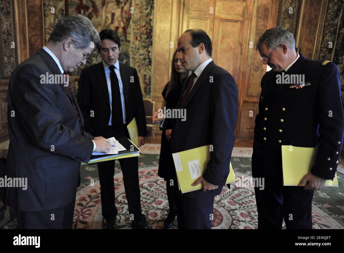 French President's diplomatic advisor and sherpa Jean-David Levitte speaks with Olivier Colom and French President's advisor technical at the diplomatic committee charged with Americas, Russia, the Caucasus, Balkans and the Central Asia Damien Loras during the visit of Brazilian President at the Elysee presidential Palace in Paris, France on November 14, 2009. Lula arrived in Europe on November 14 to attend a UN food agency meeting in Rome and discuss climate change and military jets in Paris, to boost Brazil's air force's capabilities of patrolling the Amazon and offshore oil fields. Photo by Stock Photo