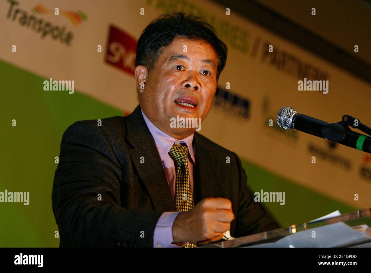 Cao Dewang, CEO of Fuyao Glass Industry Group (China) and Ernst & Young World Entrepreneur of the Year 2009, gestures as he delivers a speech during the closing conference of Economic World Forum, in Lille, France, on Novembre 21, 2009. Photo by Mikael Li Stock Photo