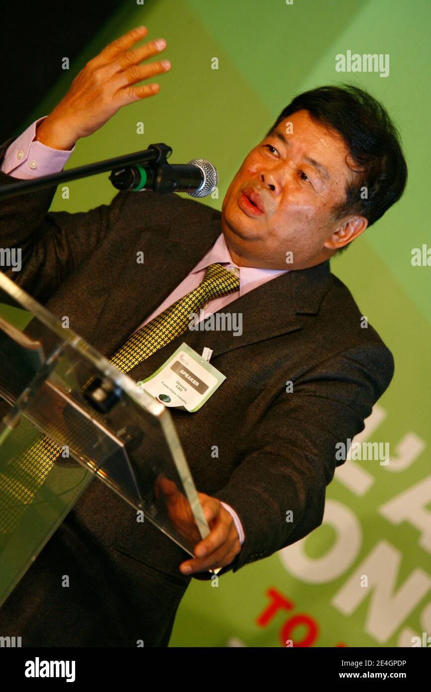 Cao Dewang, CEO of Fuyao Glass Industry Group (China) and Ernst & Young World Entrepreneur of the Year 2009, gestures as he delivers a speech during the closing conference of Economic World Forum, in Lille, France, on Novembre 21, 2009. Photo by Mikael Li Stock Photo