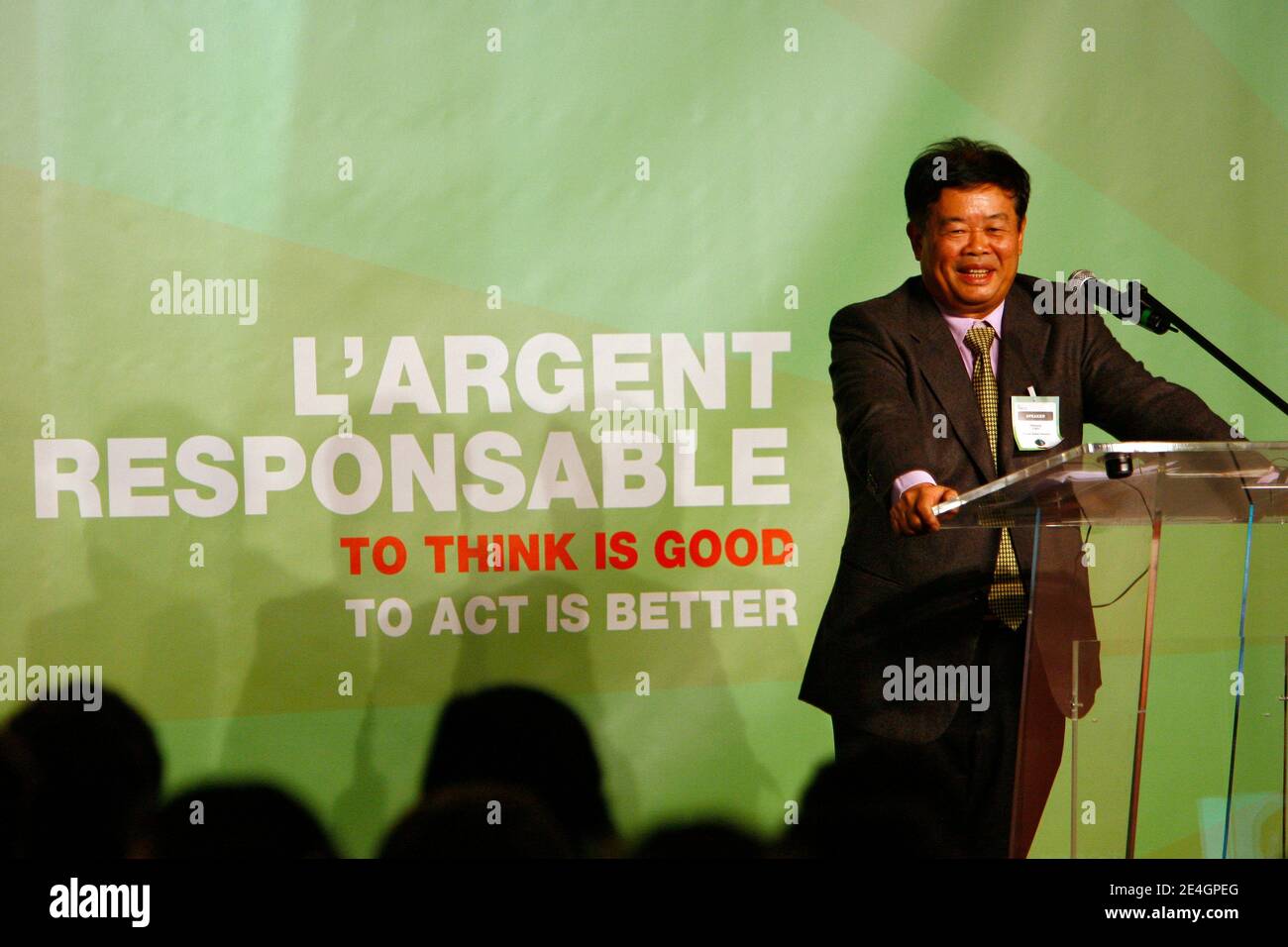 Cao Dewang, CEO of Fuyao Glass Industry Group (China) and Ernst & Young World Entrepreneur of the Year 2009, gestures as he delivers a speech during the closing conference of Economic World Forum, in Lille, France, on Novembre 21, 2009. Photo by Mikael Li Stock Photo