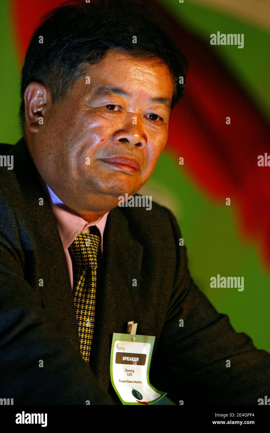 Cao Dewang, CEO of Fuyao Glass Industry Group (China) and Ernst & Young World Entrepreneur of the Year 2009, gestures as he delivers a speech during the closing conference of Economic World Forum, in Lille, France, on Novembre 21, 2009. Photo by Mikael Li Stock Photo