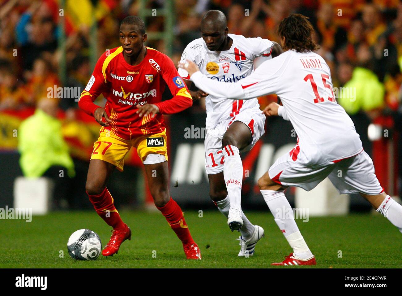 Lens' Samba Sow fights for the ball with Nancy's Bakaye Traore and Youssouf  Hadji (R) during the French First League soccer match, RC Lens vs AS Nancy  Lorraine at Felix Bollaert Stadium