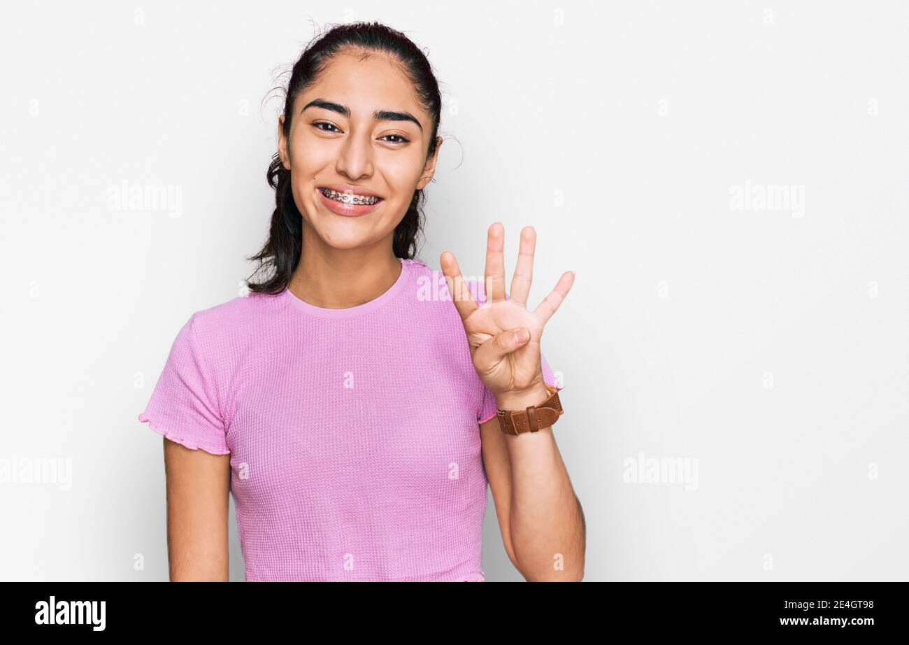 Girl showing four fingers hand hi-res stock photography and images - Alamy
