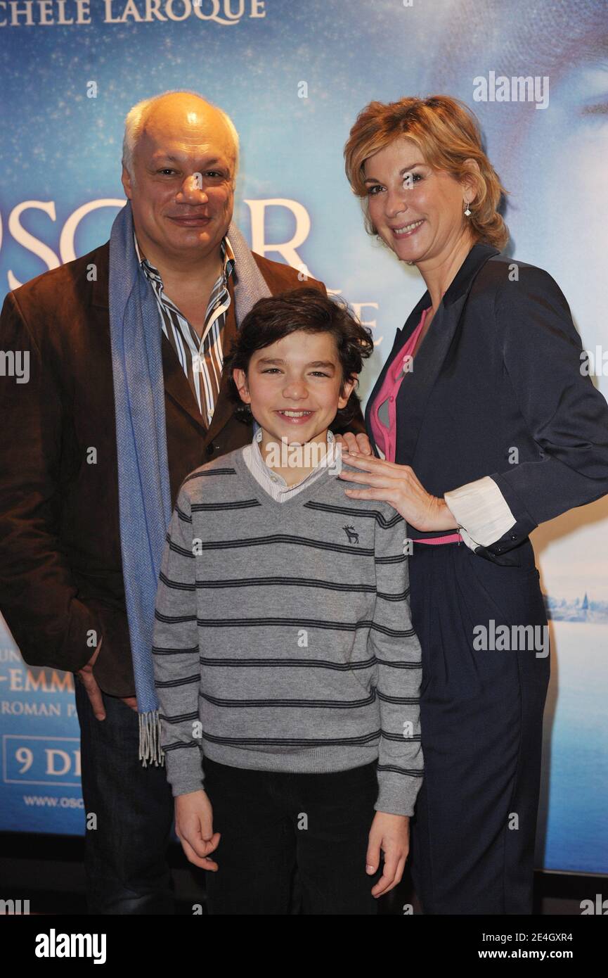 L-R) Writer/director Eric-Emmanuel Schmitt and cast members Amir and  Michele Laroque attend the premiere of 'Oscar et la Dame Rose' at the UGC  Bercy theatre in Paris, France on November 29, 2009.