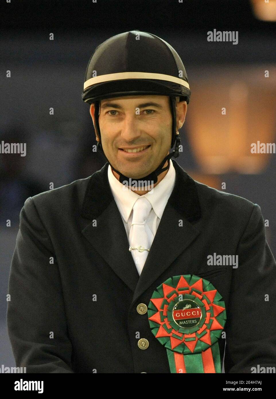 French humorist Nicolas Canteloup and former Swiss tennis champion Martina  Hingis to win 5th and 6th place at the Gucci Master Jumping in Villepinte,  Paris, France, on December 11, 2009. Photo by