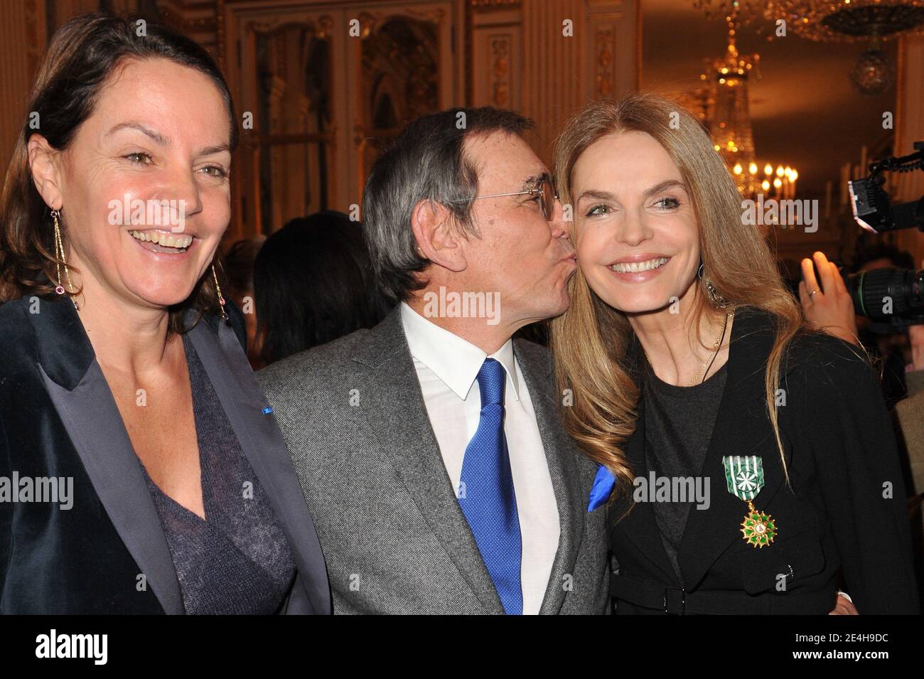 French actress Cyrielle Claire (R), here with her husband and Cendrine ...