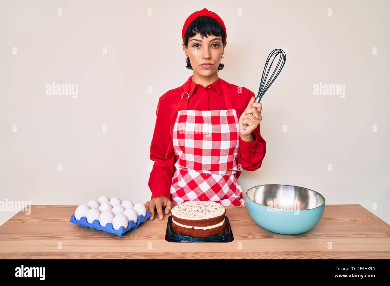 Beautiful cook using whisk hi-res stock photography and images - Alamy