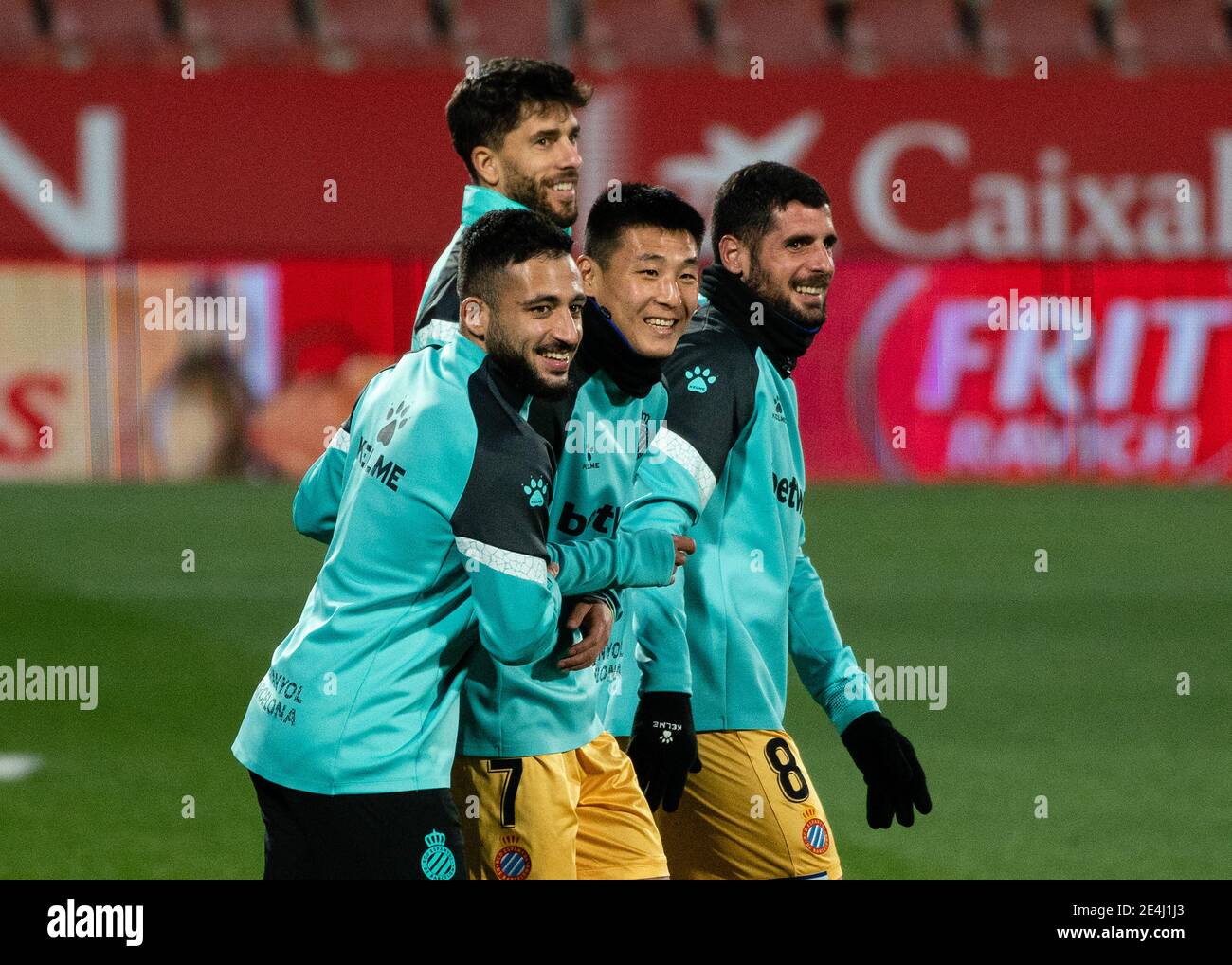 Girona, Spain. 23rd Jan, 2021. Espanyol's Wu Lei (C) warms up with his teammates Matias Vargas(L), Fran Merida (R) and Didac Vila prior to a Spanish second division league match between Girona FC and RCD Espanyol in Girona, Spain, on Jan. 23, 2021. Credit: Joan Gosa/Xinhua/Alamy Live News Stock Photo