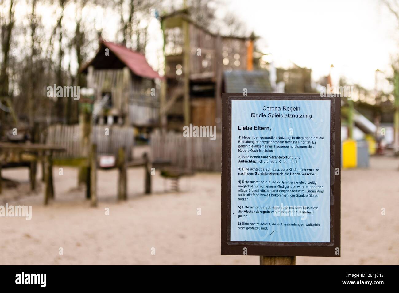 Gettorf, Germany. 22nd Jan, 2021. Corona rules for playground use are written on a sign at Gettorf Zoo. Since 16 December 2020, the zoos in Schleswig-Holstein are closed again. Credit: Frank Molter/dpa/Alamy Live News Stock Photo