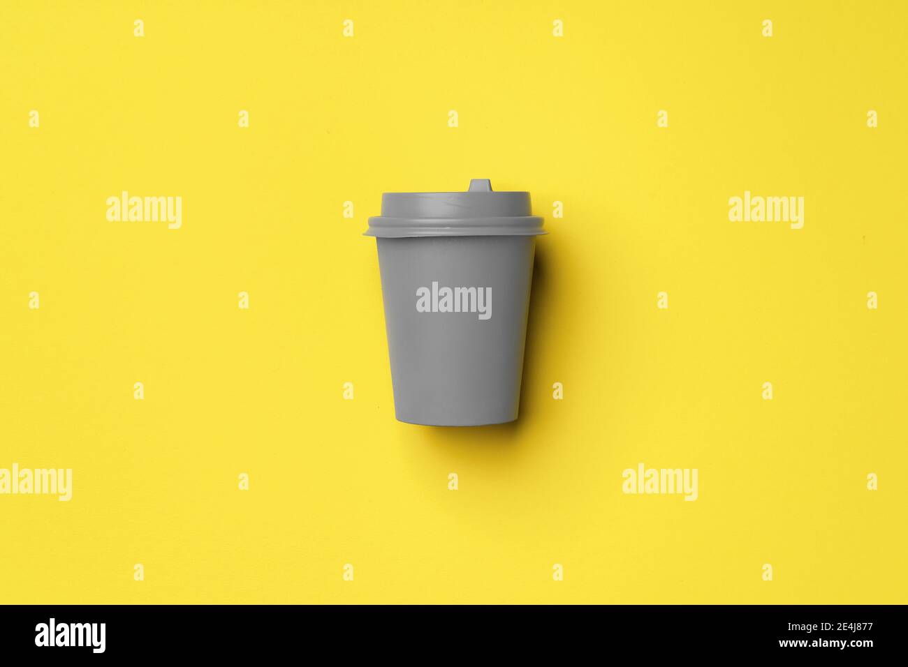 Disposable coffee cup in yellow gray colors Stock Photo Alamy