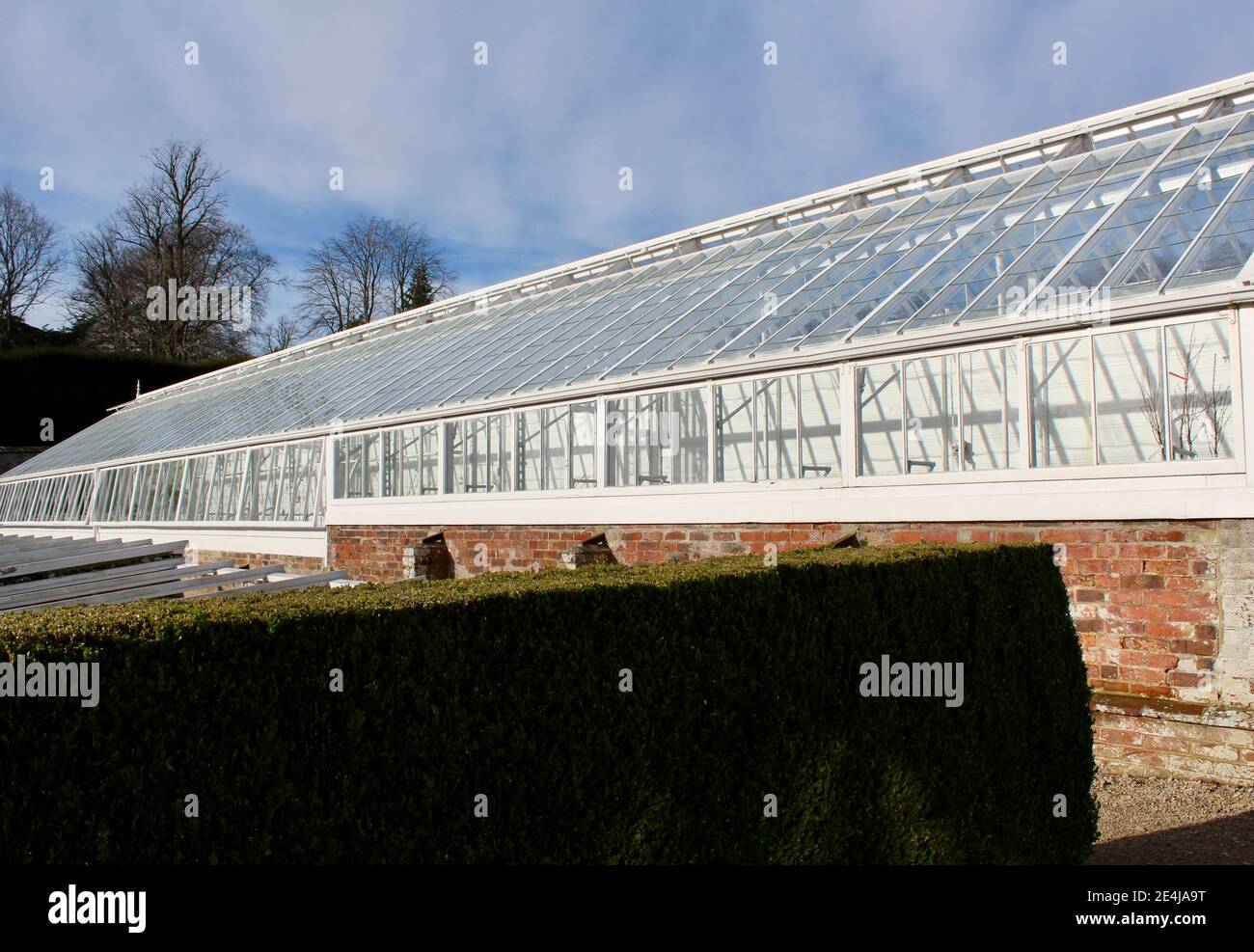 Victorian glasshouse at West Dean Gardens, Chichester with copy space to just add text if needed. Stock Photo