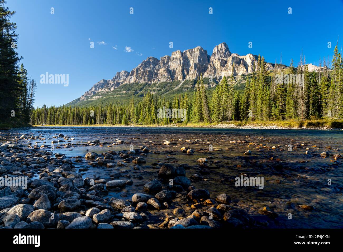 Castle Mountain and Bow River in summer sunny day. Castle Mountain ...