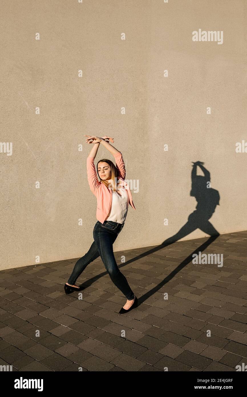 Blond woman dancing performance hi-res stock photography and images - Alamy
