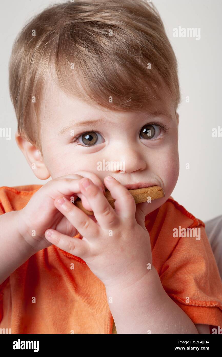 Caucasian boy in orange shirt hires stock photography and images Alamy