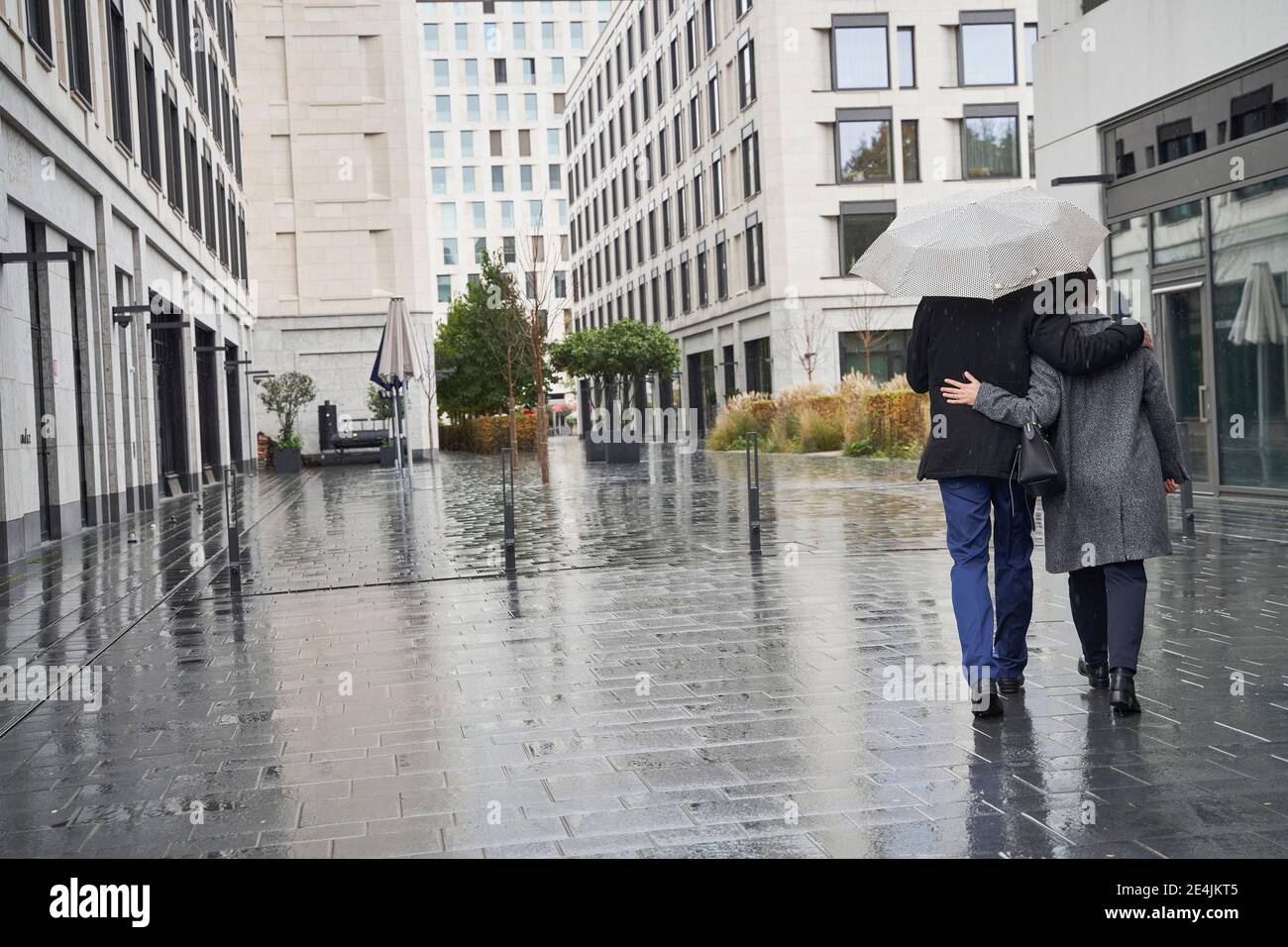 Walking Arm In Arm Business High Resolution Stock Photography And Images Alamy