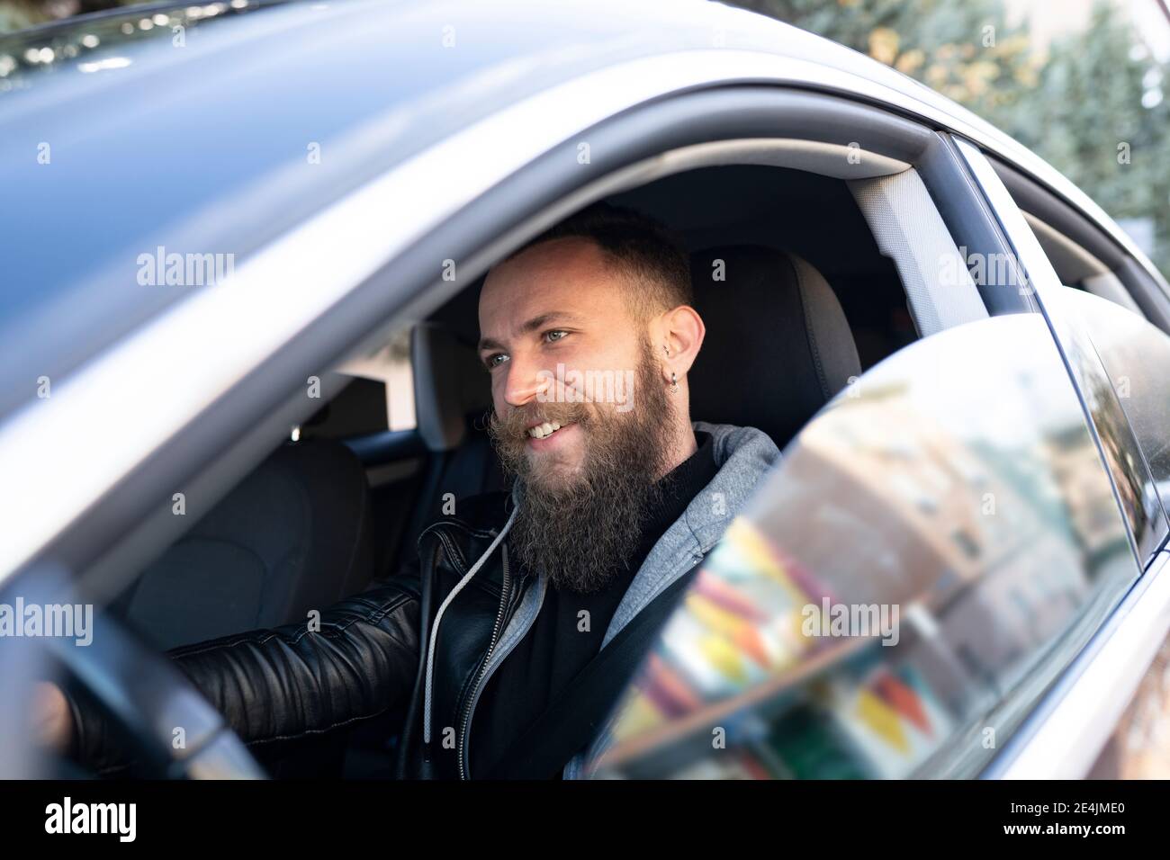 Bearded man driving hi-res stock photography and images - Alamy