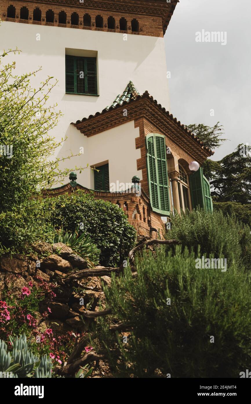house with green shutters Stock Photo - Alamy