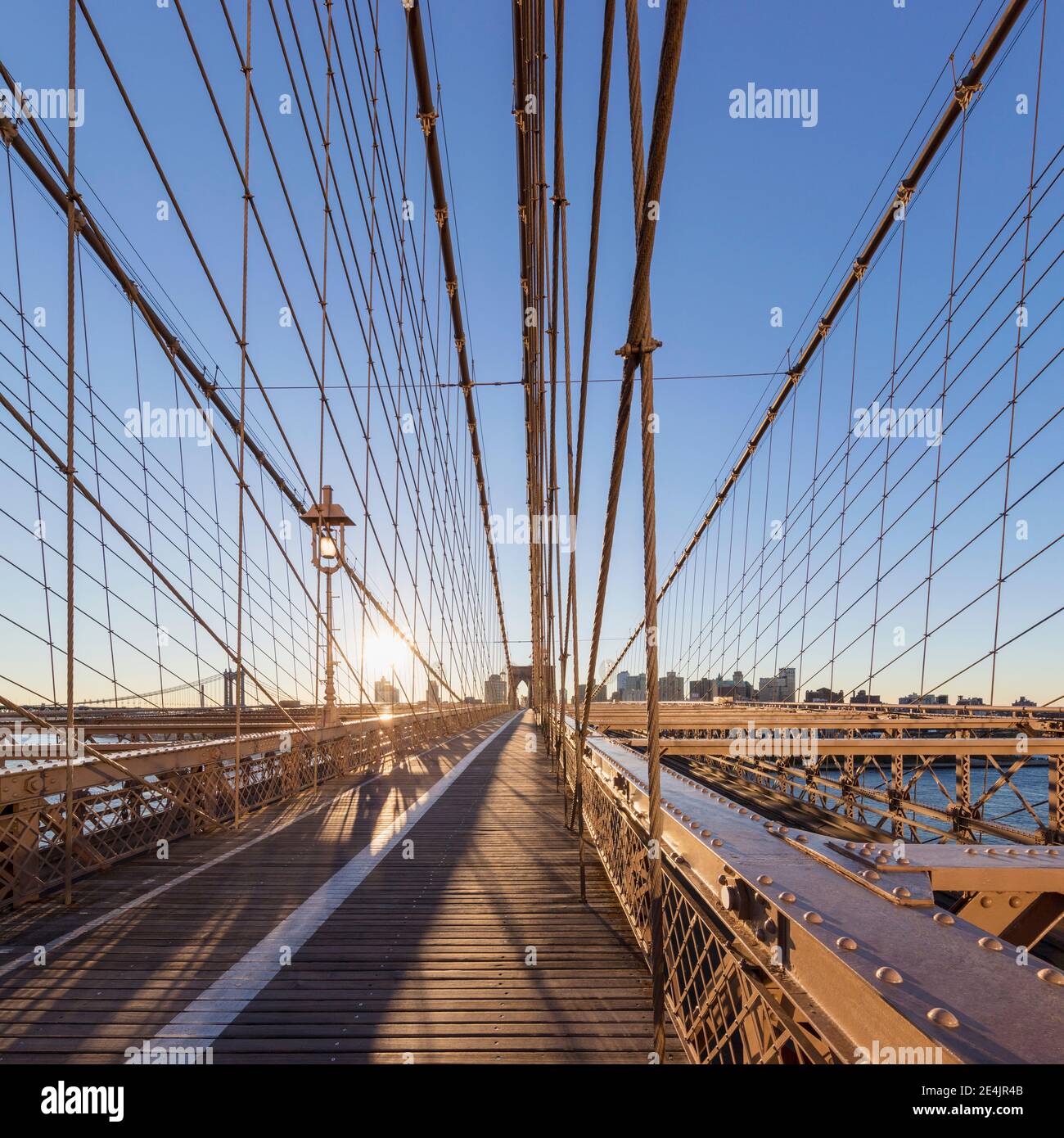 USA, New York, New York City, Brooklyn Bridge at sunrise Stock Photo ...