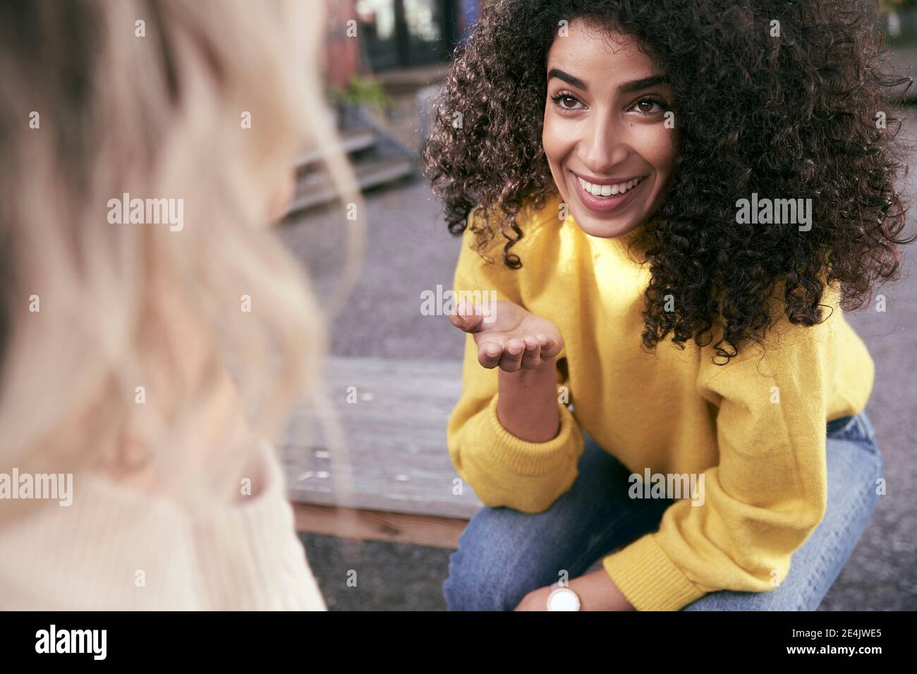 Black woman talking friend on hi-res stock photography and images - Alamy