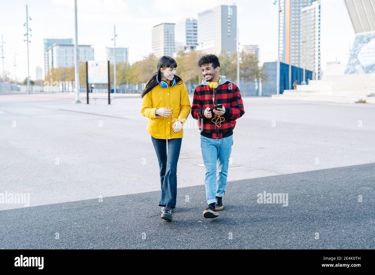 Young couple walking talking on hi-res stock photography and images - Alamy