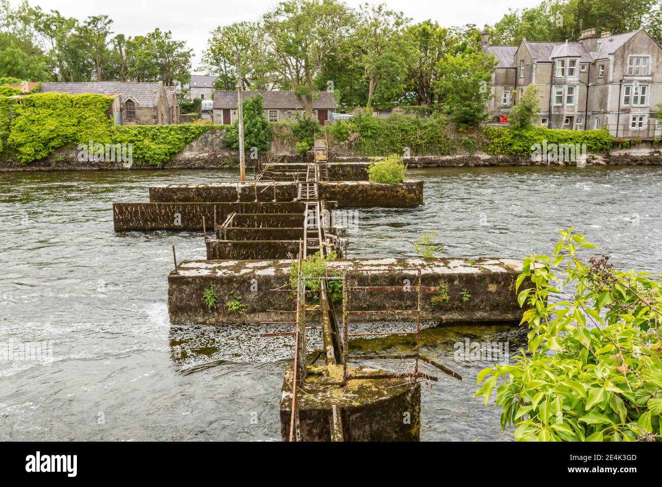 The Salmon Weir in the river Corrib (Eglinton Canal) with flowing water ...