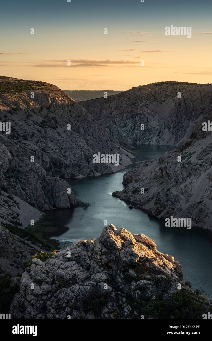 River in canyon at sunset Stock Photo