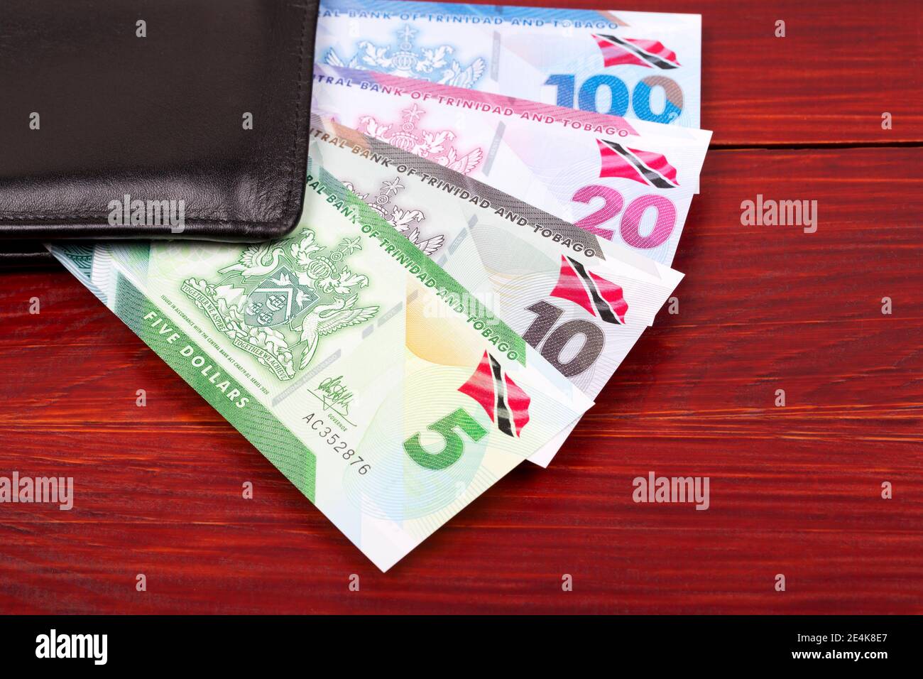 Trinidad and Tobago dollar in the black wallet Stock Photo Alamy