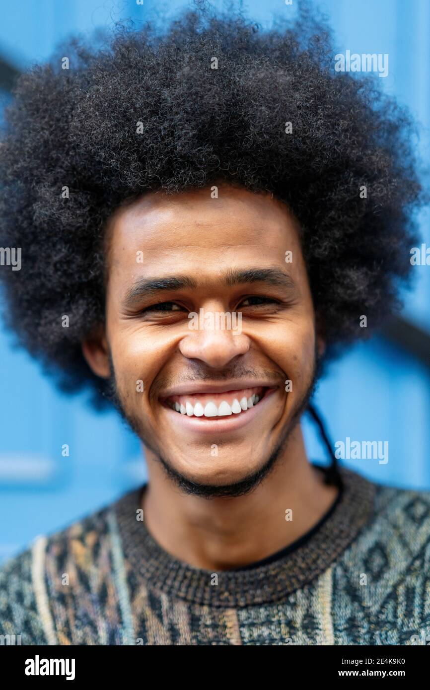 Close up young man curly hi-res stock photography and images - Alamy