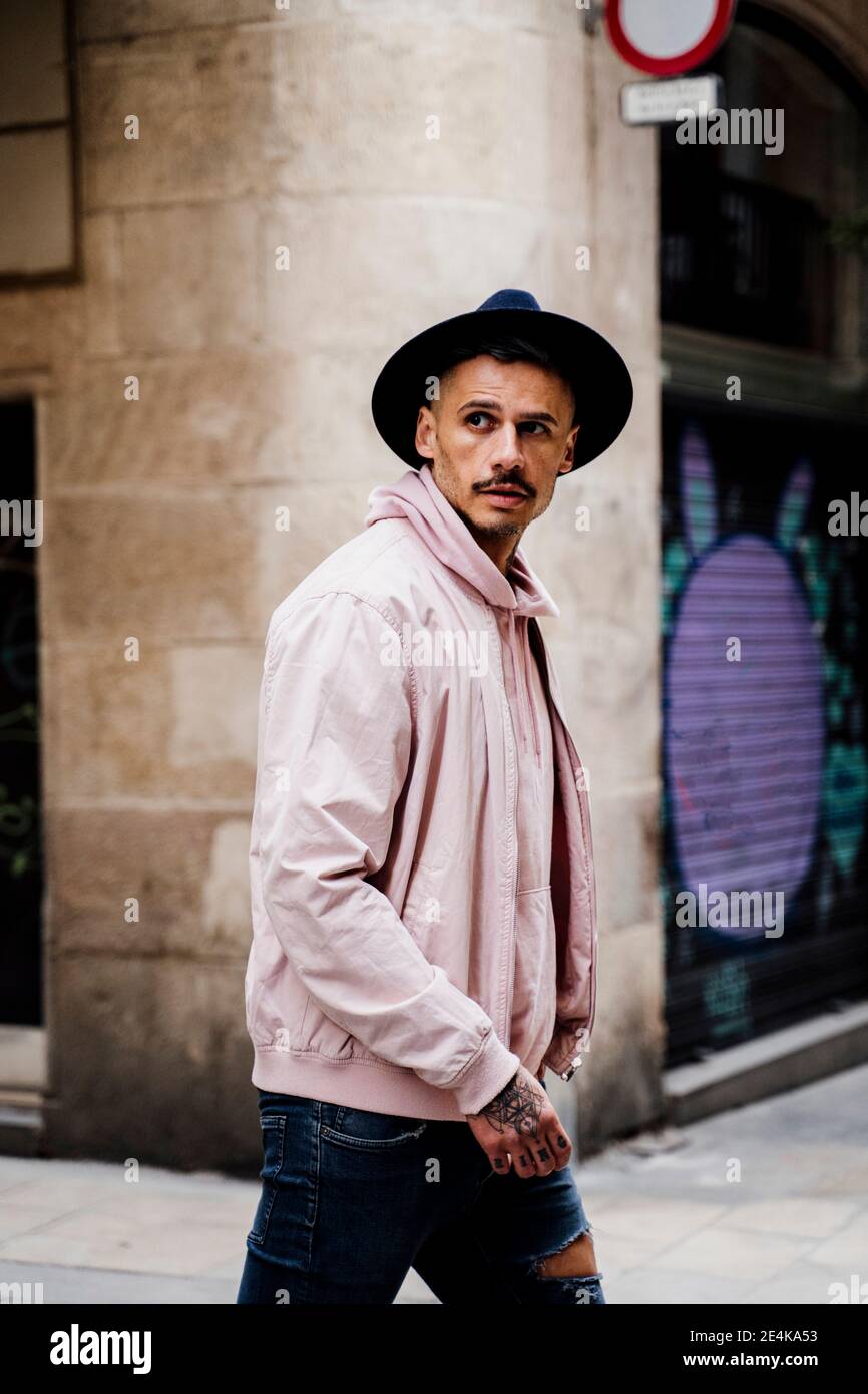 Man walking side view jacket hi-res stock photography and images - Alamy