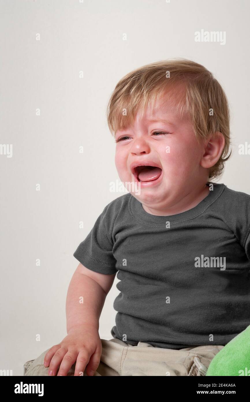 Caucasian boy in orange shirt hires stock photography and images Alamy