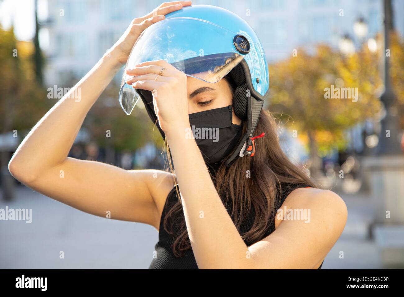 Woman wearing motorbike helmet hi-res stock photography and images - Alamy