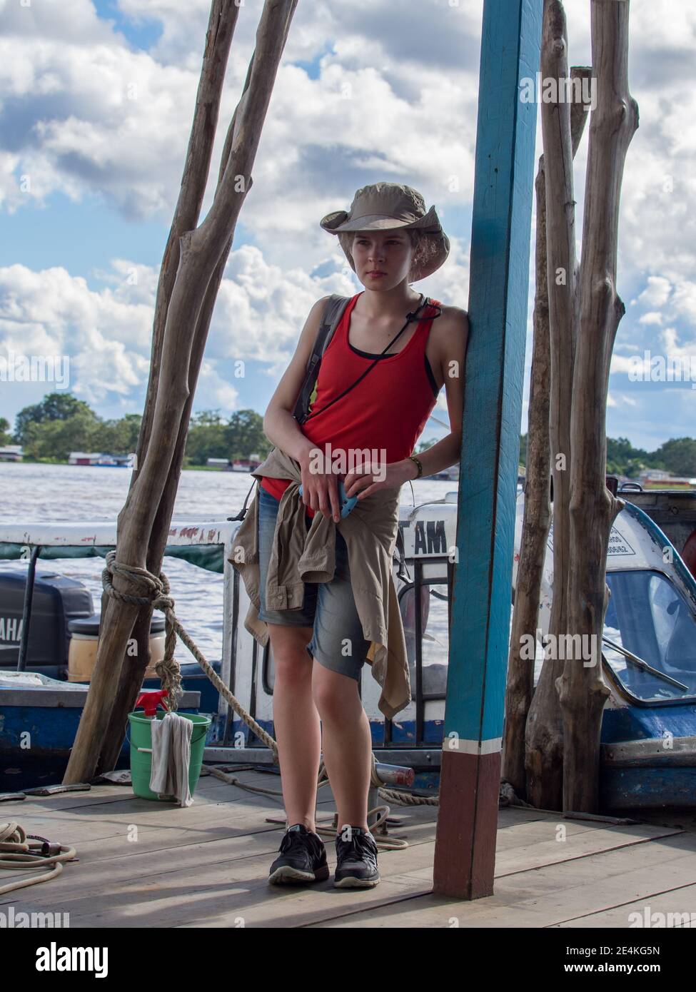 Tabatinga, Brazil - May 5, 2016: Young woman in a port on Amazon river,  Amazonia. Latin America Stock Photo