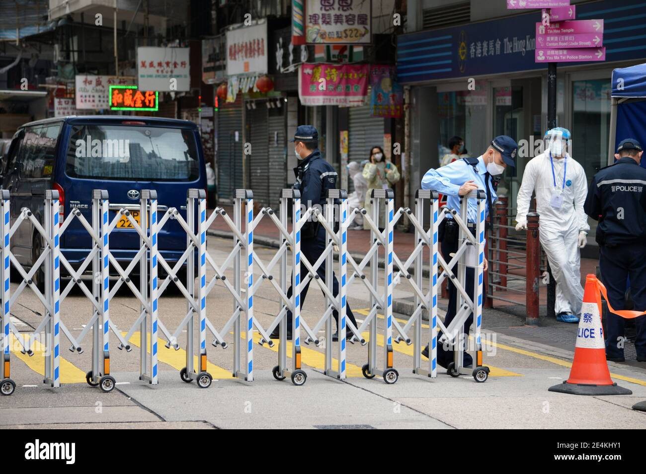 Hong Kong Police checkpoint during Covid-19 coronavirus pandemic lockdown in Yau Ma Tei, Kowloon, Hong Kong in January 2021 Stock Photo
