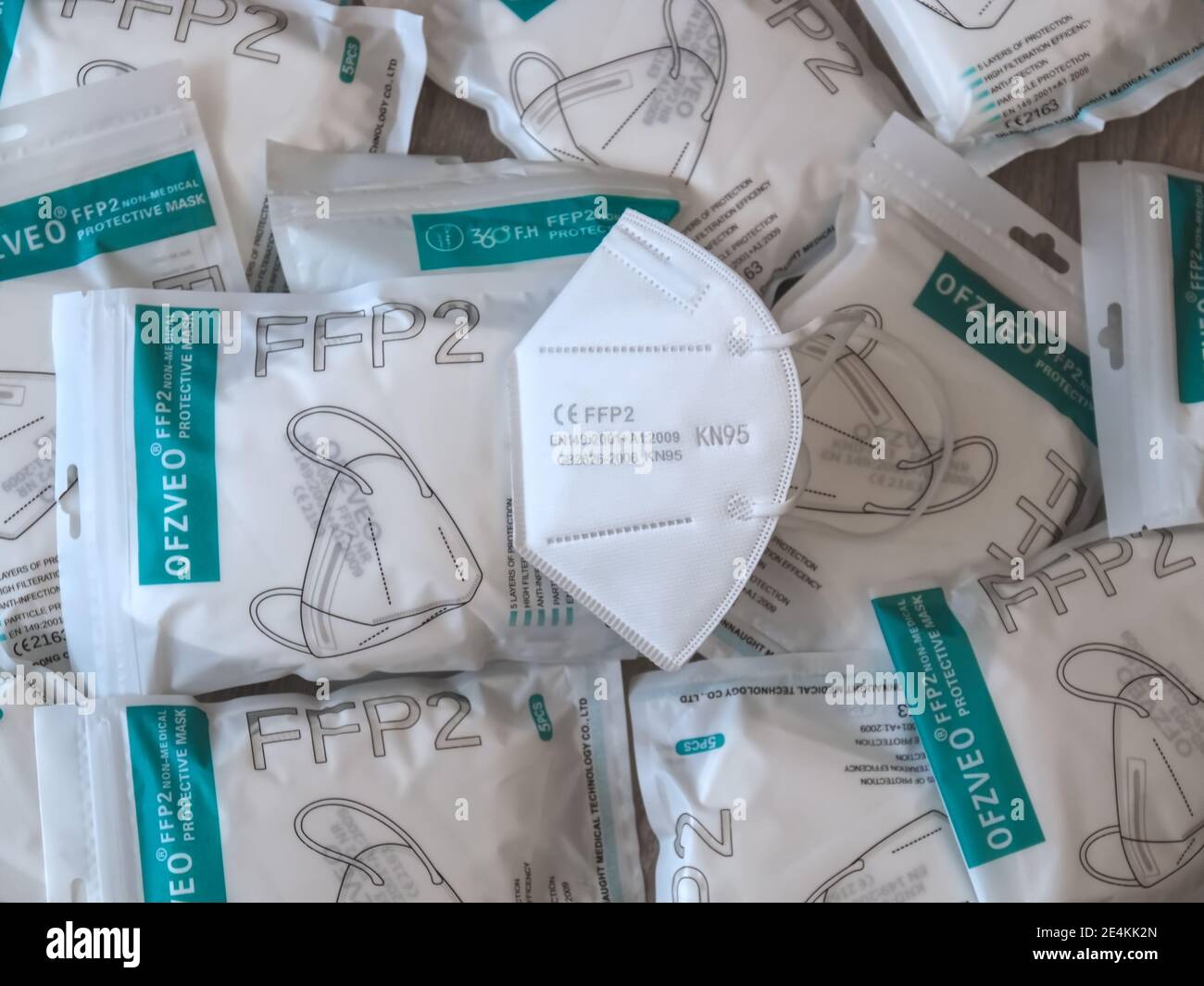 Many Packages with FFP2 protection masks to help against Corona pandemic Stock Photo