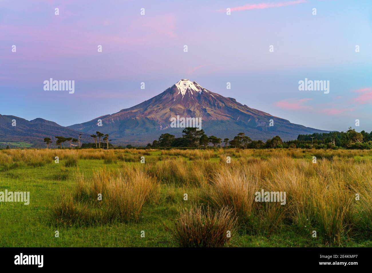 sunset at cone volcano mount taranaki in new zealand Stock Photo Alamy