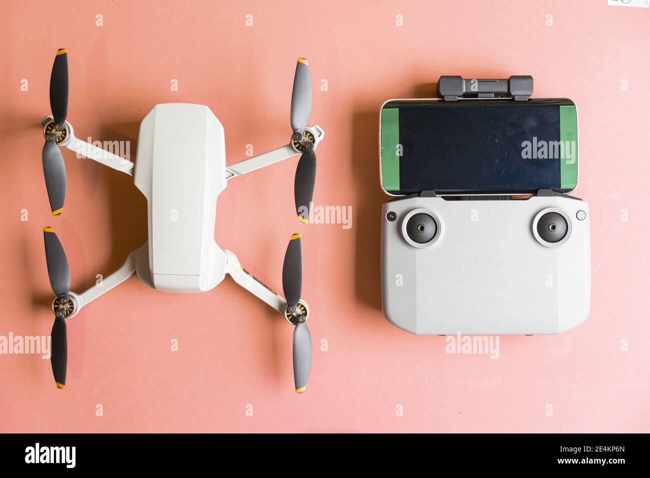 drone top view and remote control. concept flying drone on flat background.  flat lay flat design. copy space Stock Photo - Alamy