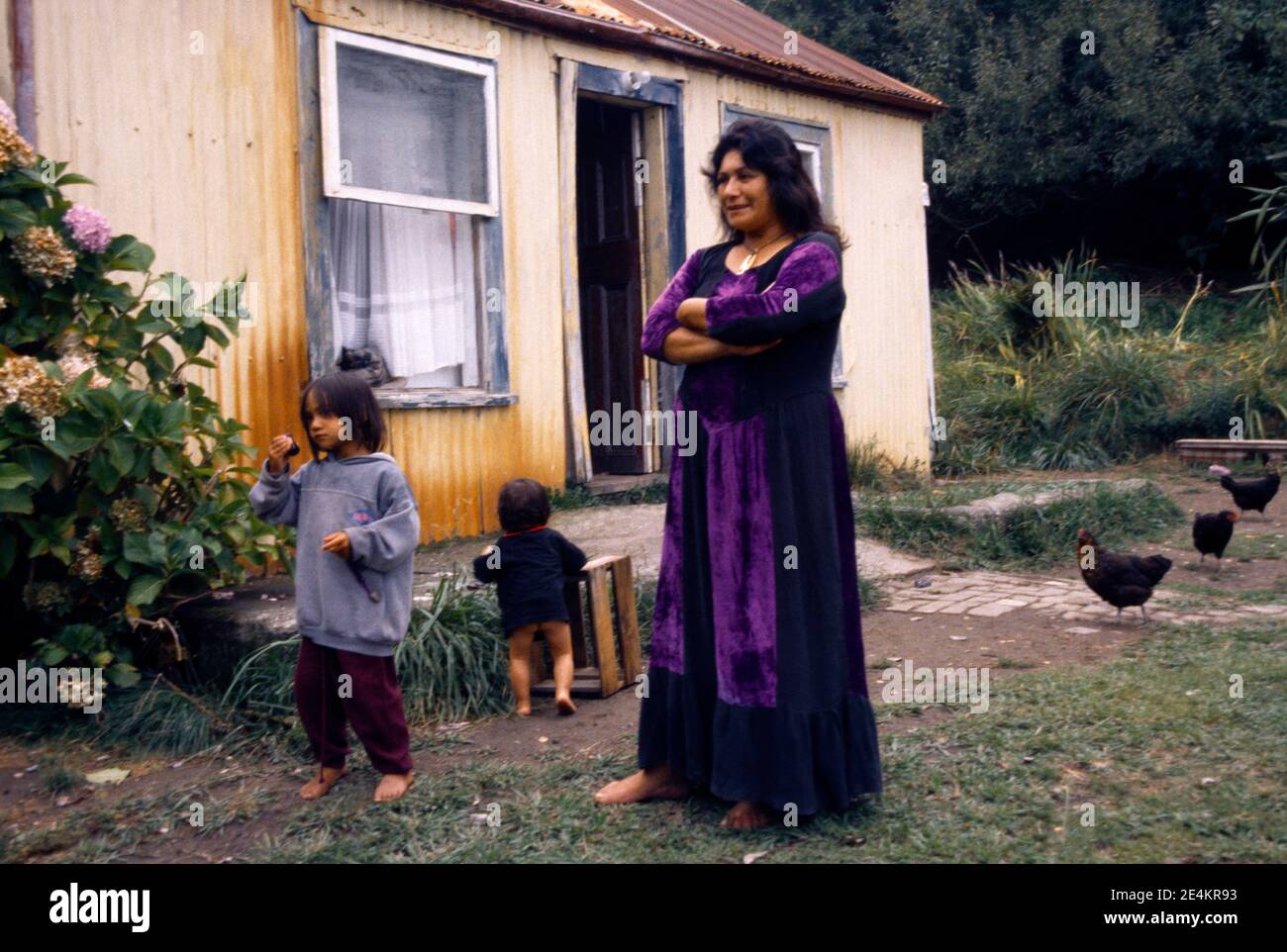 East Cape New Zealand Maori Family outside their Home Stock Photo