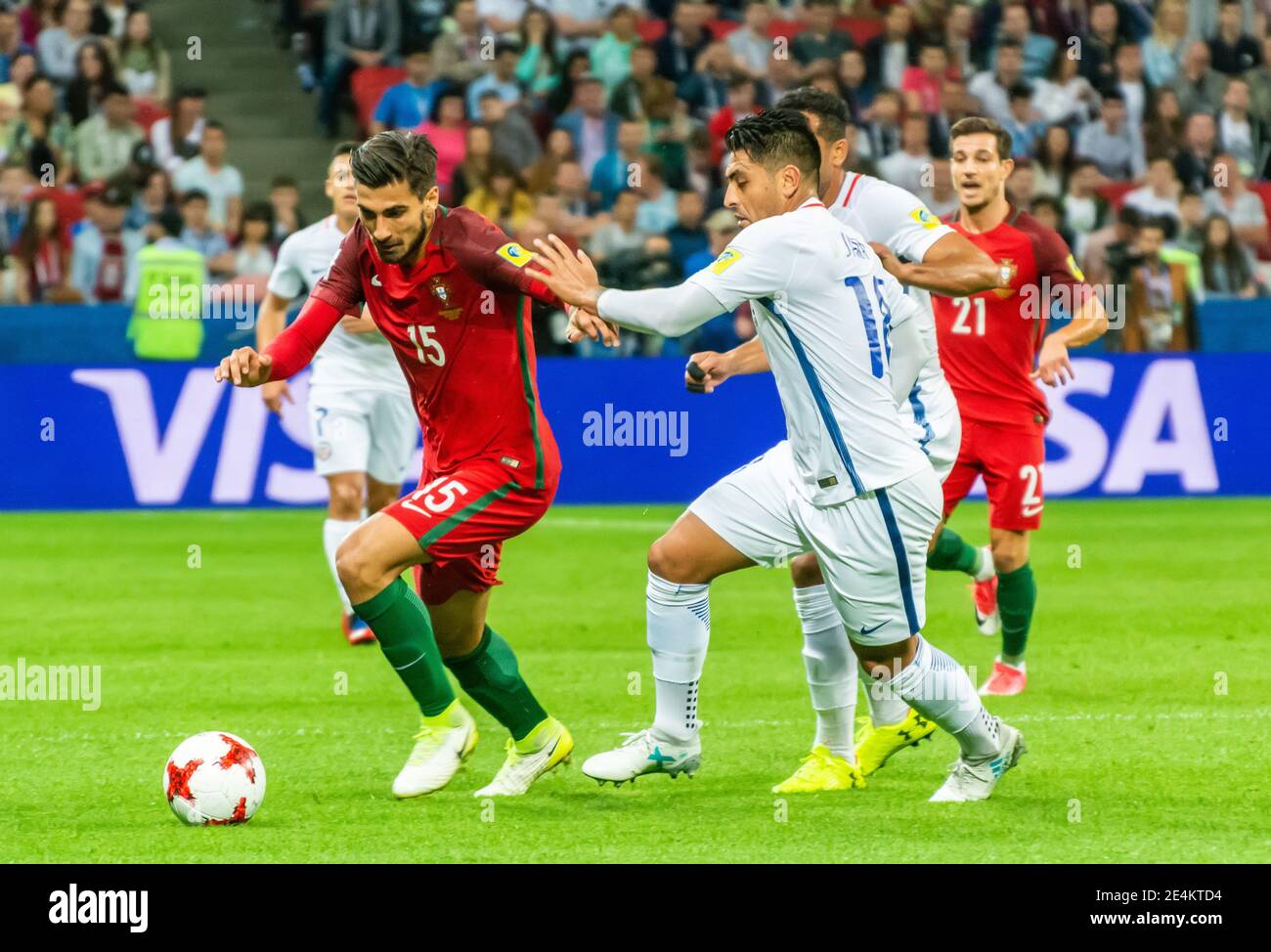 Kazan, Russia – June 28, 2017. Portugal national football team midfielder Andre Gomes against Chile defender Gonzalo Jara during FIFA Confederations C Stock Photo