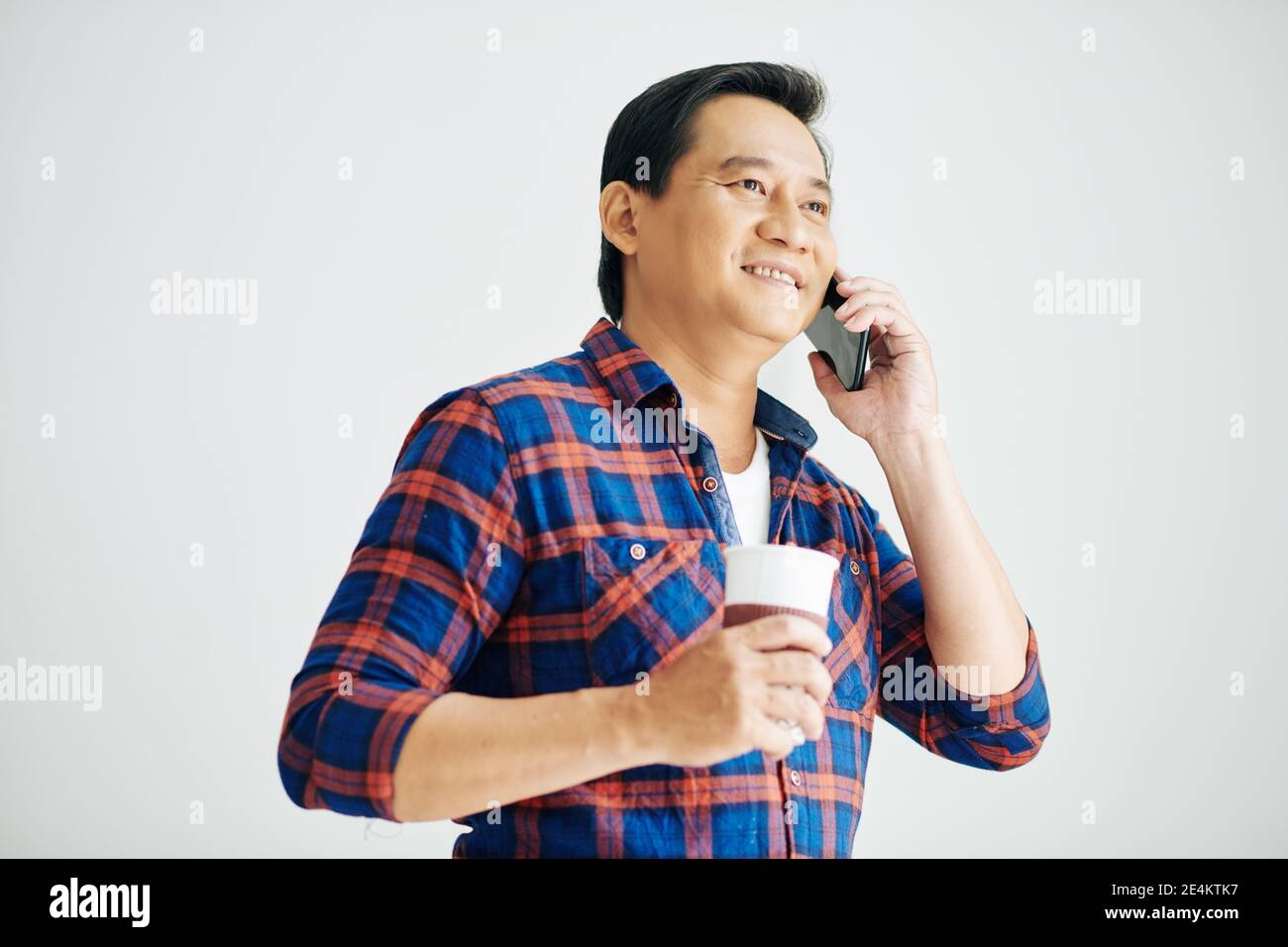 Mature man calling on phone Stock Photo