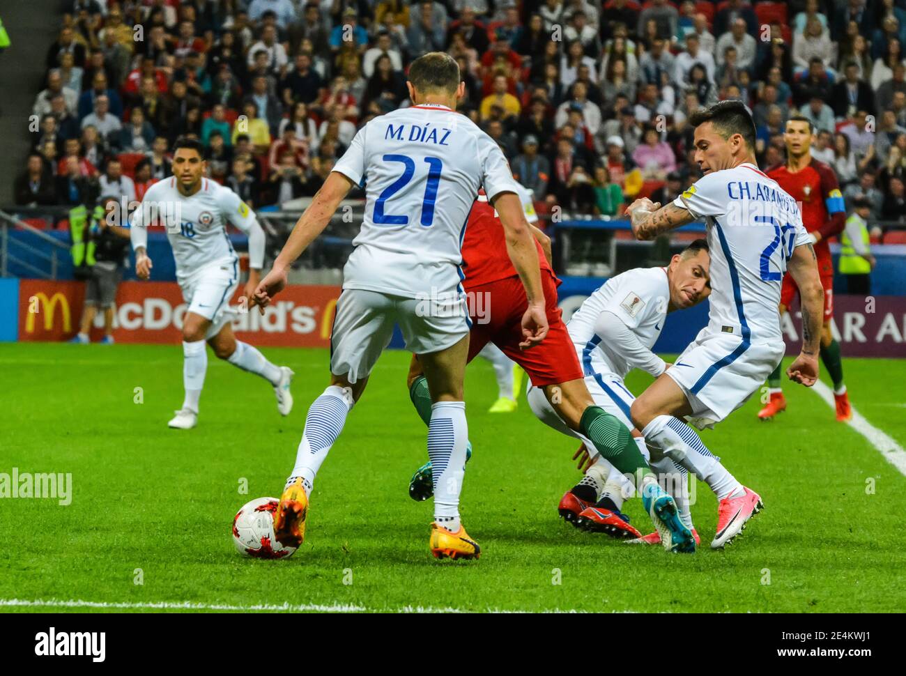 Kazan, Russia – June 28, 2017. Portugal striker Andre Silva against Chile players Marcelo Diaz, Gary Medel and Charles Aranguiz during FIFA Confederat Stock Photo