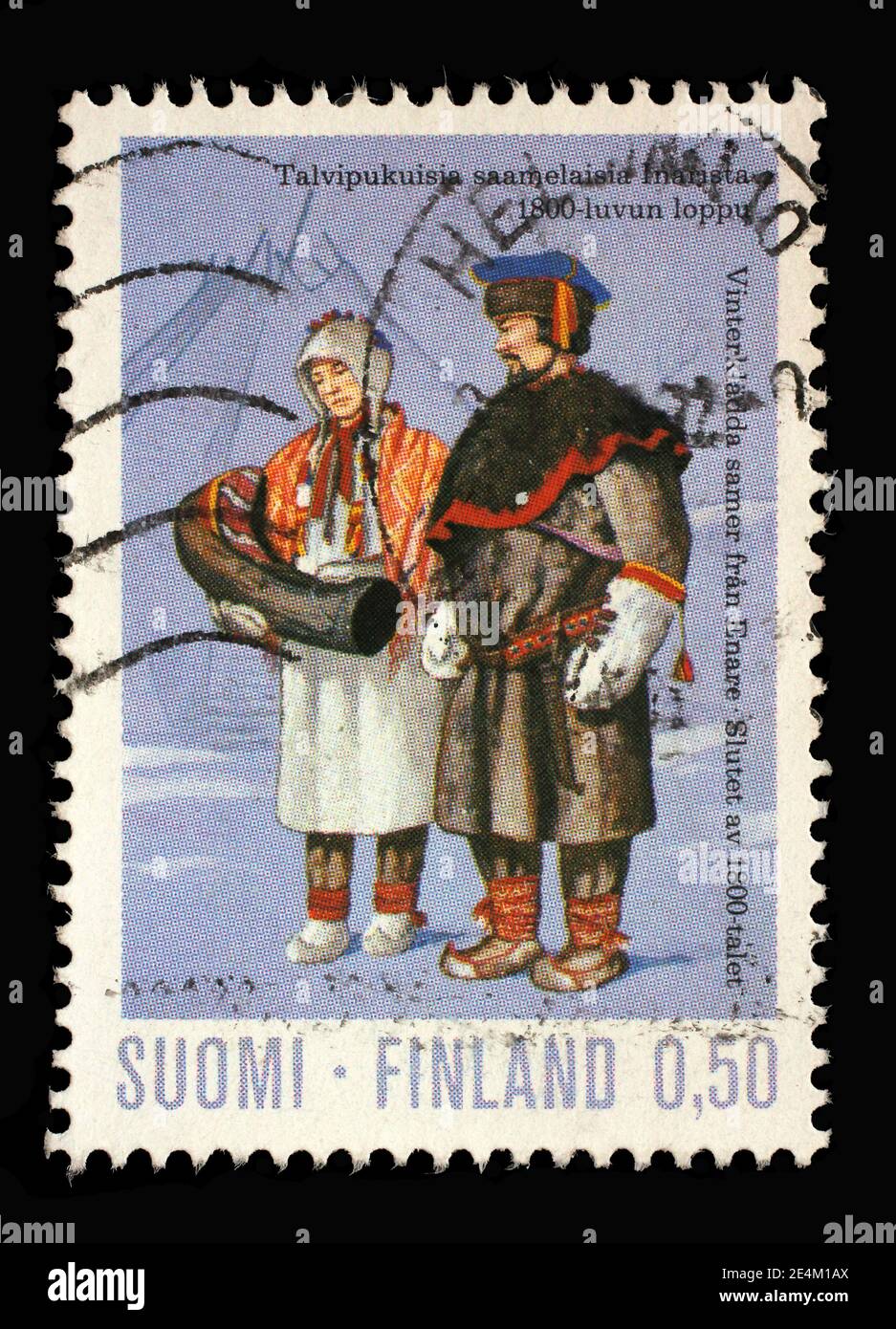 Stamp printed in the Finland shows Sami people in Winter Costume (19th Century), circa 1972 Stock Photo