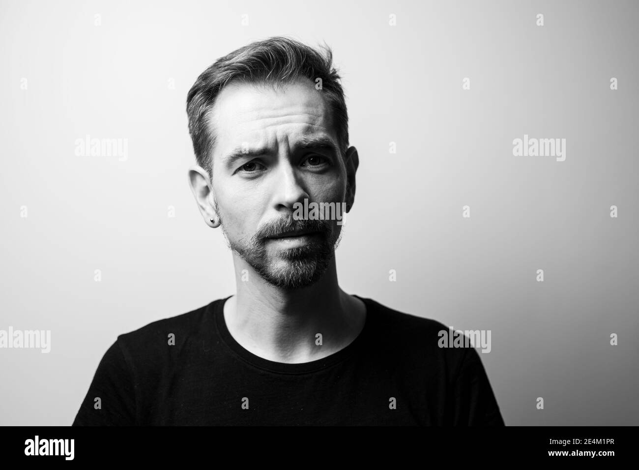 Portrait of a sad man. Black and white Stock Photo - Alamy