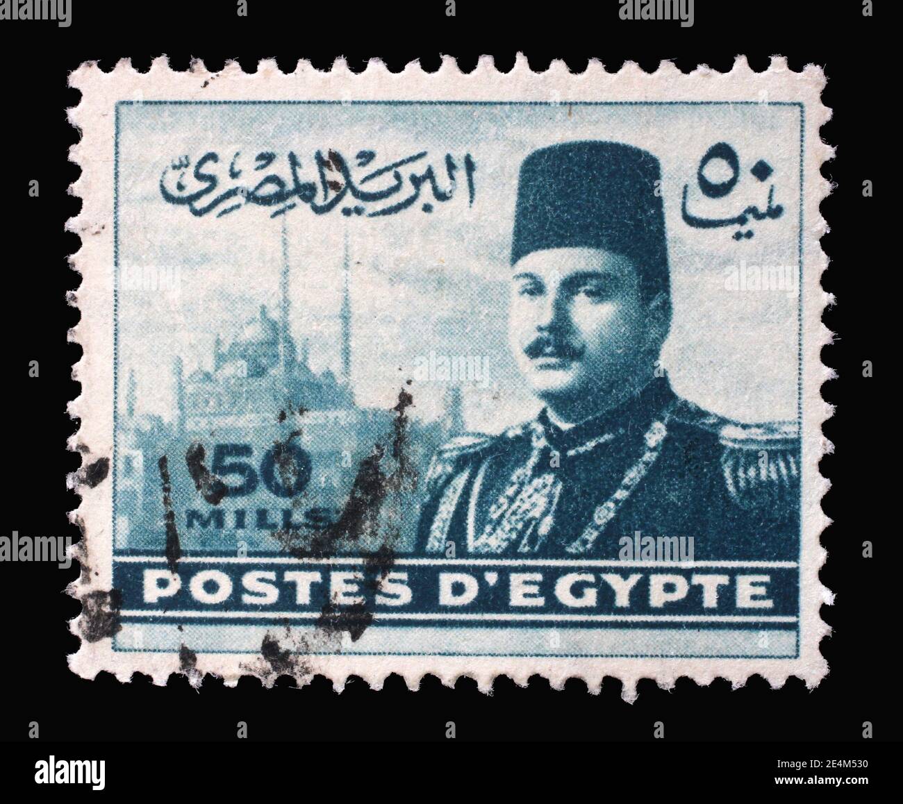 Stamp printed in Egypt shows King Farouk in front of Cairo Citadel, circa 1947 Stock Photo