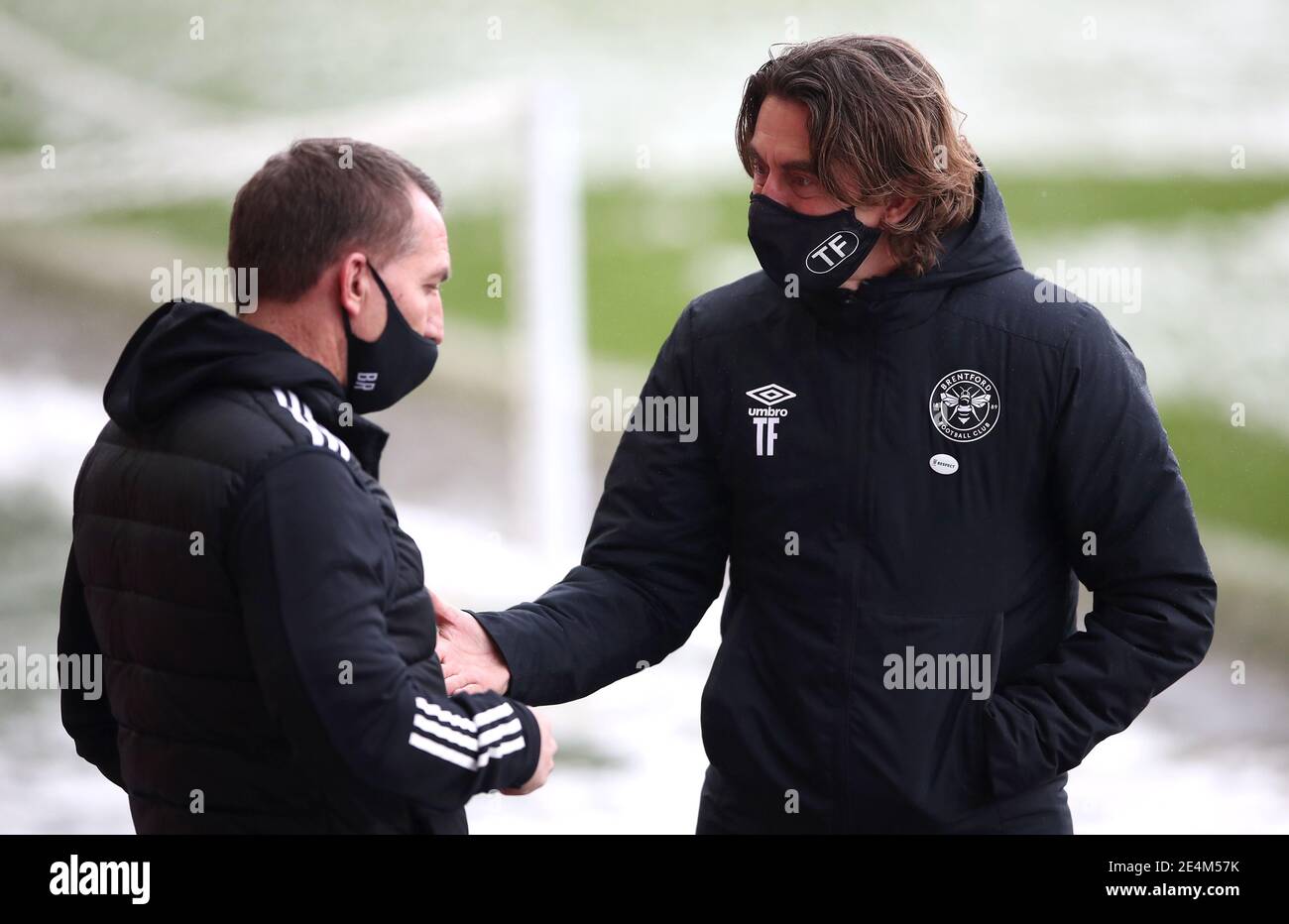 Leicester City manager Brendan Rodgers (left) and Brentford manager Thomas Frank in discussion before the Emirates FA Cup fourth round match at the Brentford Community Stadium, London. Picture date: Sunday January 24, 2021. Stock Photo