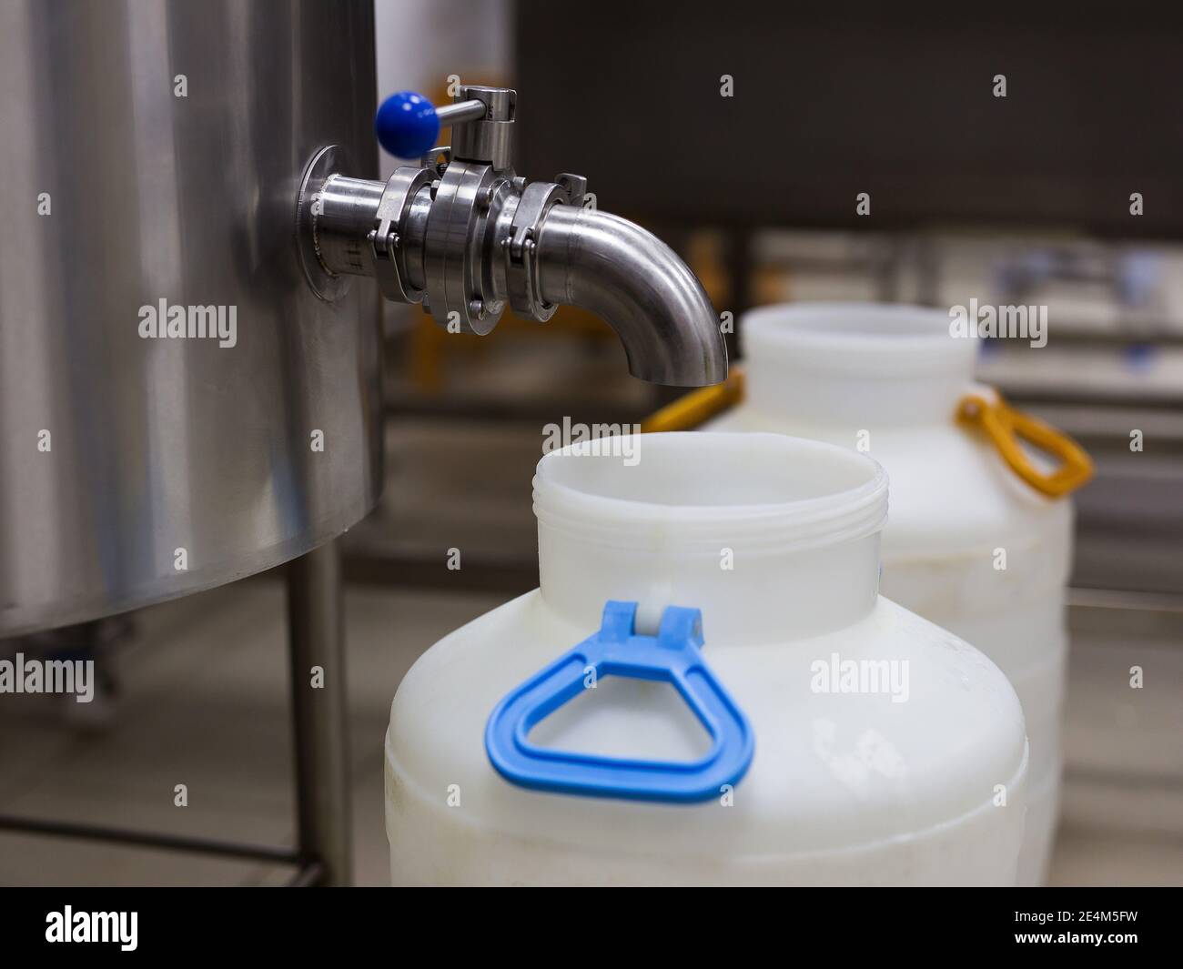 equipment of a private cheese factory and stages of preparation and ...