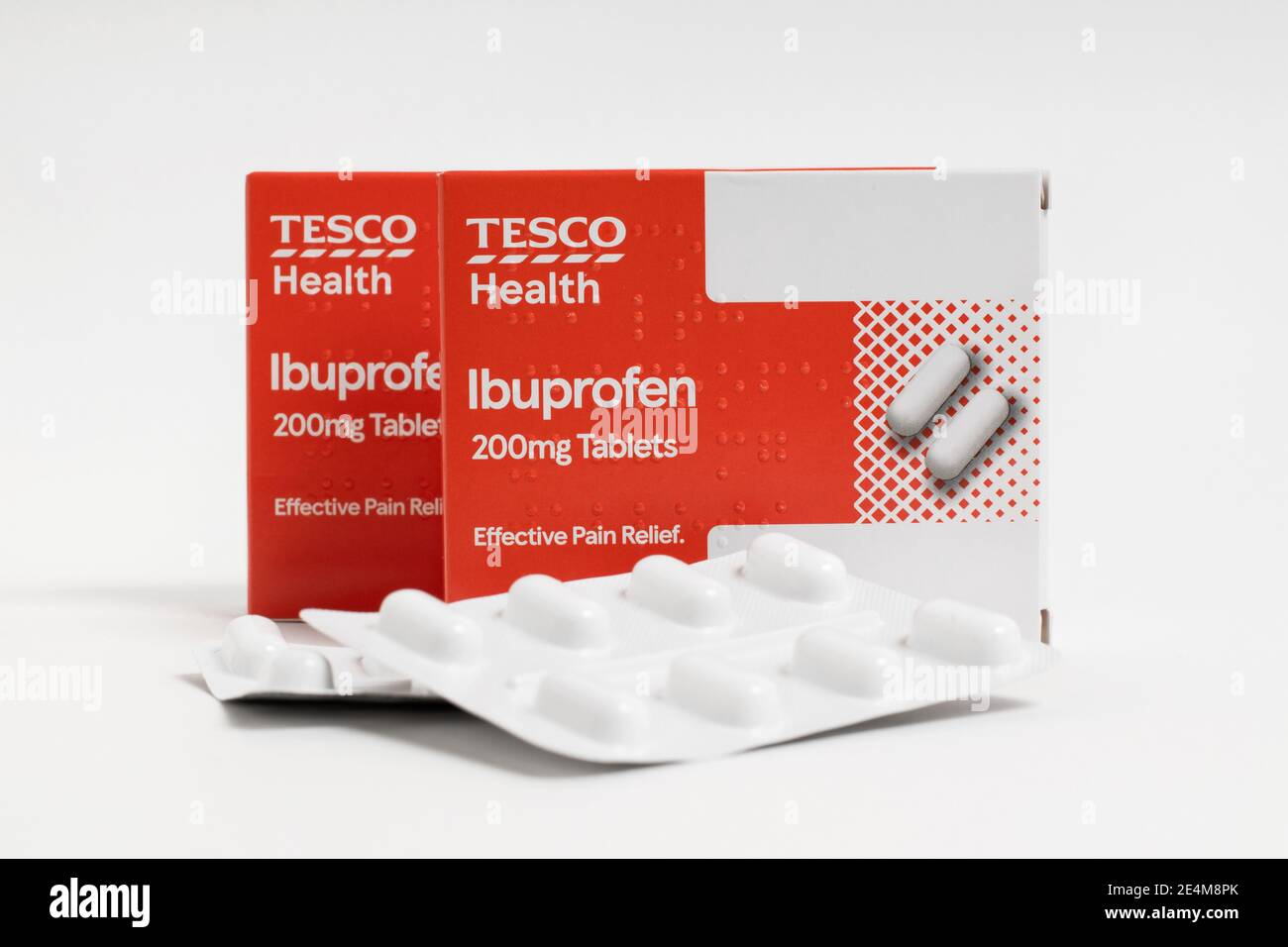 London / UK - January 23rd 2021 - Ibuprofen packets from Tesco supermarket, isolated on a white background Stock Photo